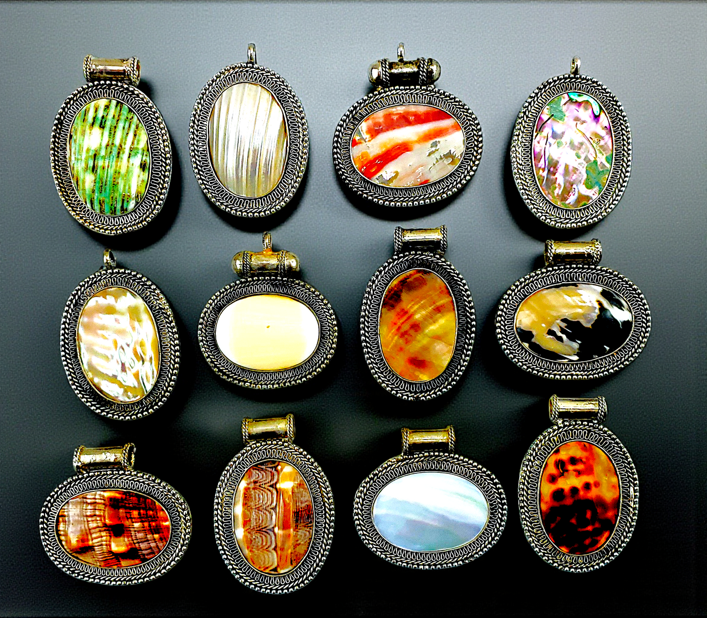 P-103A Assorted Shell Pendants Inlaid on Oval Metal Casing